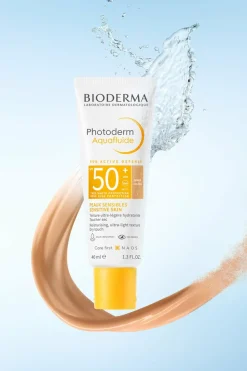 Crème solaire visage Photoderm Aquafluide SPF50+ teinte dorée