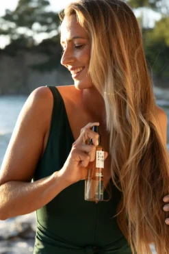 Eau solaire protectrice cheveux SPF50+