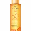 Huile bronzante visage et corps haute protection SPF50 Nuxe Sun